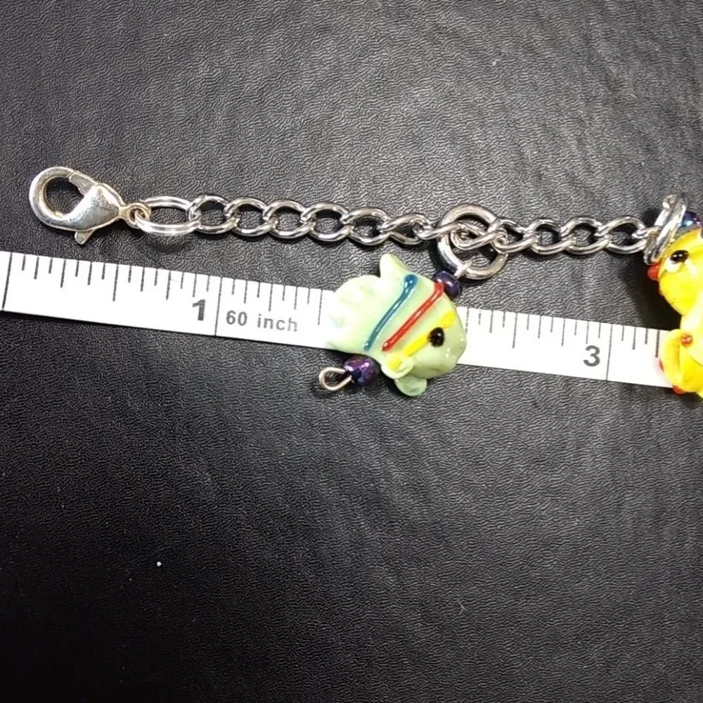 Silver tone Under The Sea charm bracelet up to 9